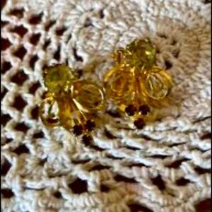 Vintage brass TRIAD clip on earrings with cinnamon and yellow rhinestones